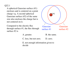 A spherical Gaussian surface (#1) encloses and is centered on a