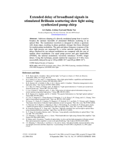 Extended delay of broadband signals in stimulated Brillouin