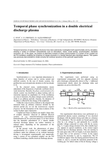 Temporal phase synchronization in a double electrical discharge plasma