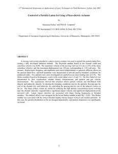 Control of a Particle-Laden Jet Using a Piezo-electric Actuator