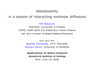Metastability in a system of interacting nonlinear diffusions