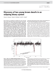 LETTERS Discovery of two young brown dwarfs in an eclipsing binary system