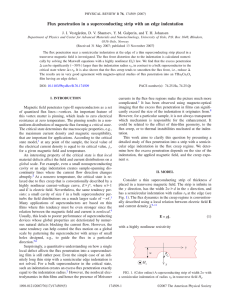 Flux penetration in a superconducting strip with an edge indentation