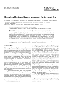 Reconfigurable atom chip on a transparent ferrite-garnet film T E P
