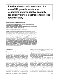 Interband electronic structure of a near- 11 grain boundary in