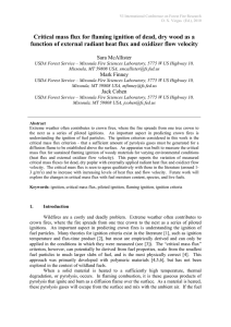 Critical mass flux for flaming ignition of dead, dry wood... function of external radiant heat flux and oxidizer flow velocity