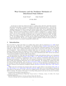 Weyl Geometry and the Nonlinear Mechanics of Distributed Point Defects Arash Yavari