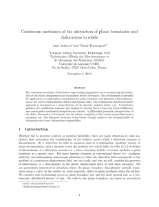 Continuum mechanics of the interaction of phase boundaries and