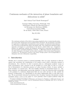 Continuum mechanics of the interaction of phase boundaries and