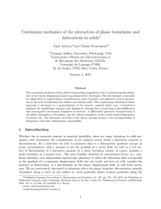 Continuum mechanics of the interaction of phase boundaries and