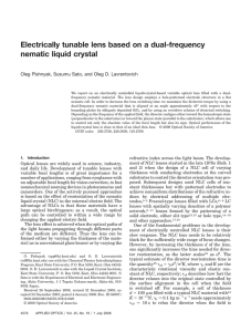 Electrically tunable lens based on a dual-frequency nematic liquid crystal