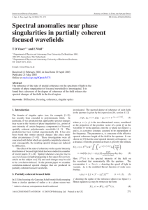 Spectral anomalies near phase singularities in partially coherent focused wavefields T D Visser