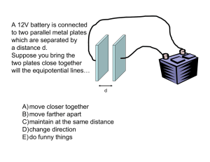 A 12V battery is connected to two parallel metal plates which are
