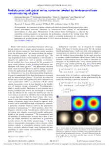 Radially polarized optical vortex converter created by femtosecond