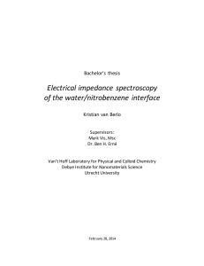Electrical impedance spectroscopy of the water/nitrobenzene interface