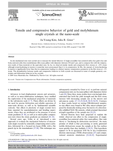 Tensile and compressive behavior of gold and