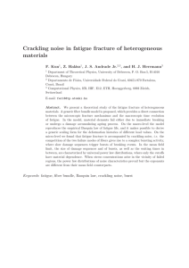 Crackling noise in fatigue fracture of heterogeneous materials