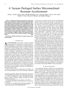 A vacuum packaged surface micromachined resonant accelerometer