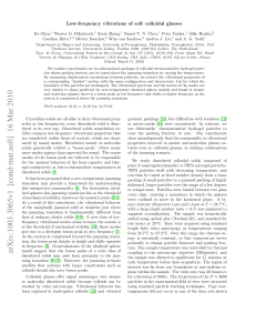 Low-frequency vibrations of soft colloidal glasses