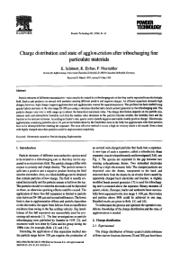 Charge distribution and state of agglomeration after tribocharging fine pariculate materials
